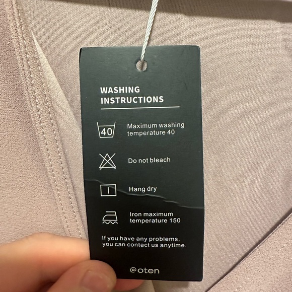 Elegant V-Neck Midi Dress in Soft Pink - Picture 7 of 14